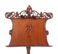 An Art Nouveau Style Carved Walnut Music Stand
