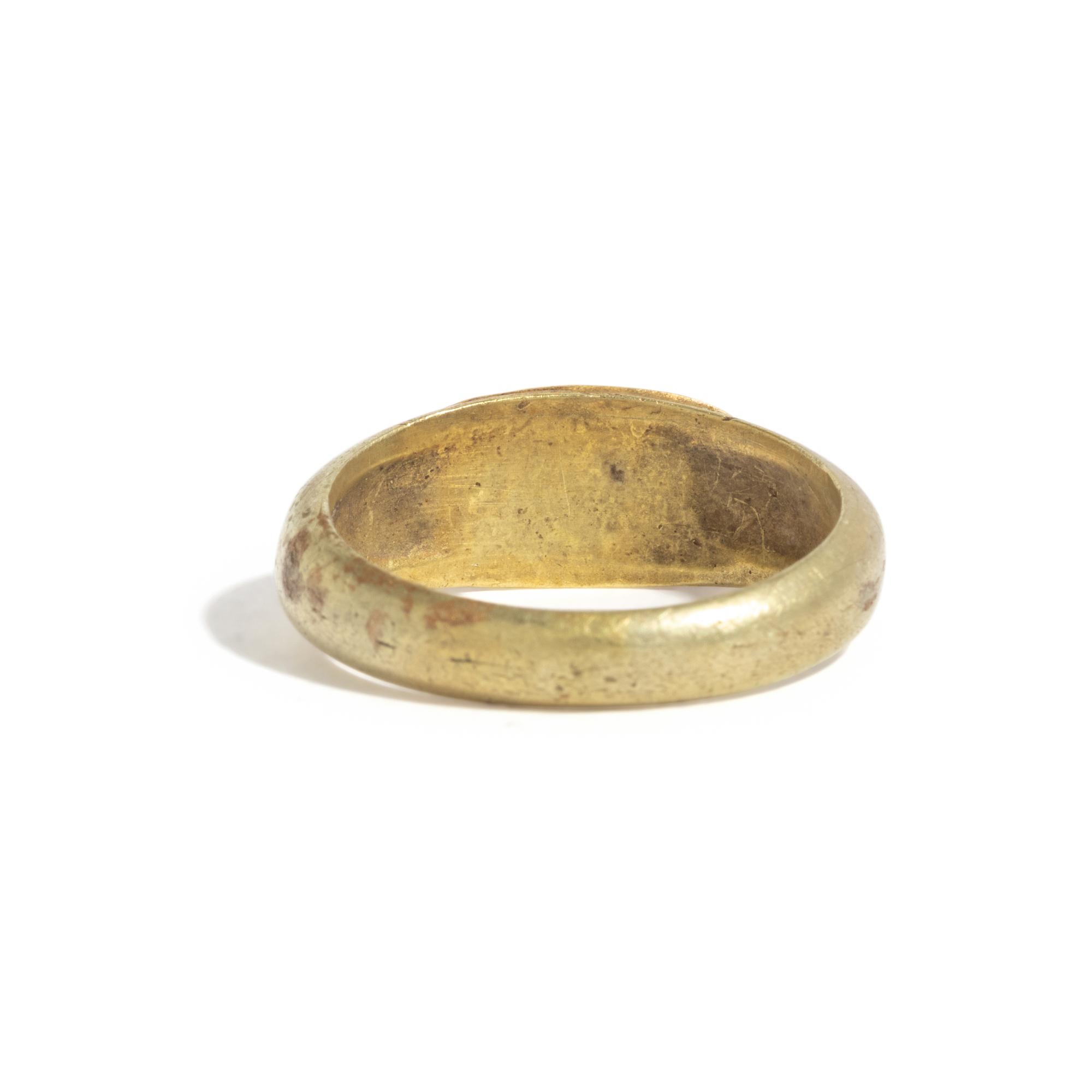 A Roman Gold and Carnelian Finger Ring with the Goddess Minerva