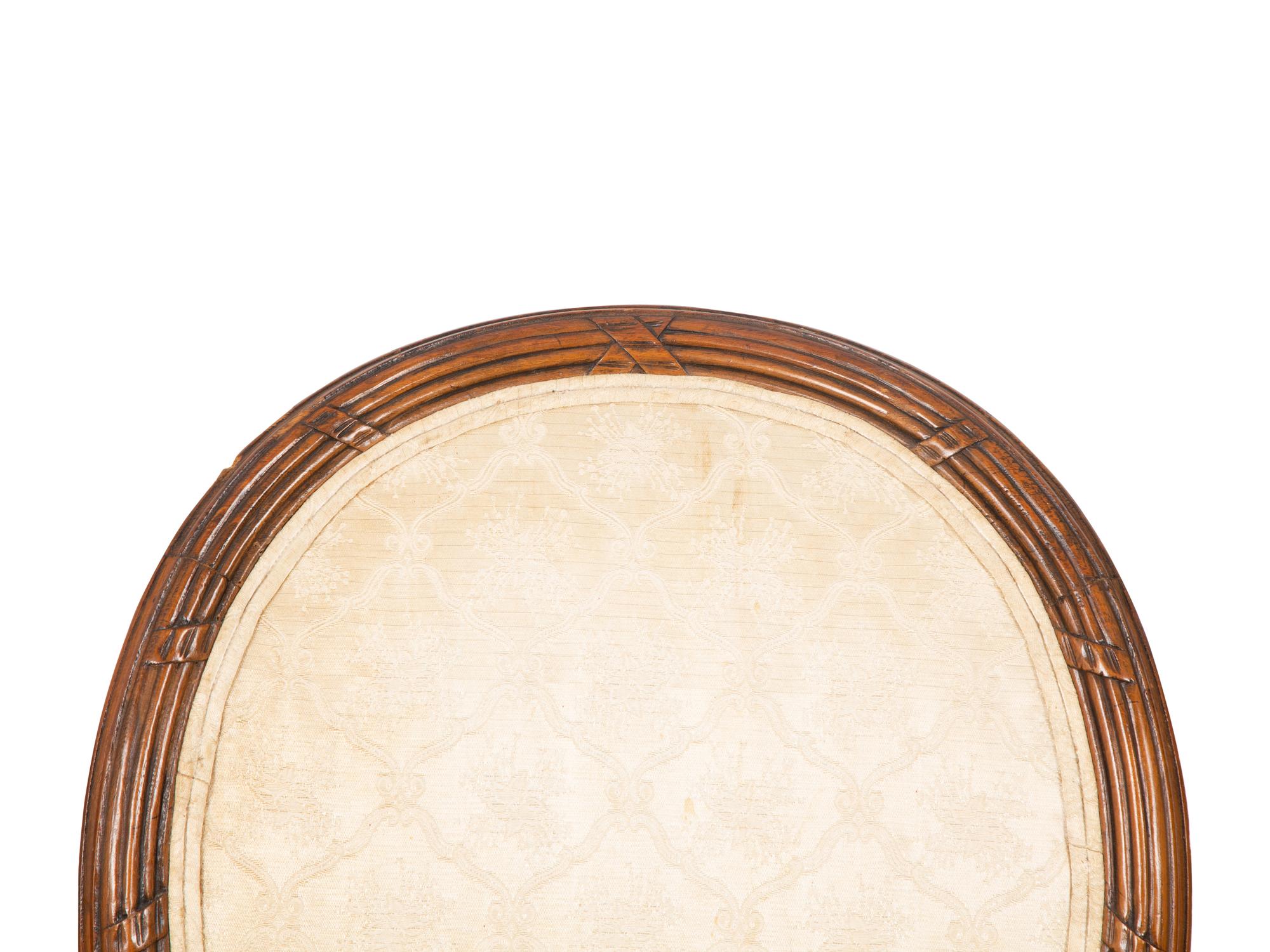 A Set of Four Louis XVI Style Side Chairs