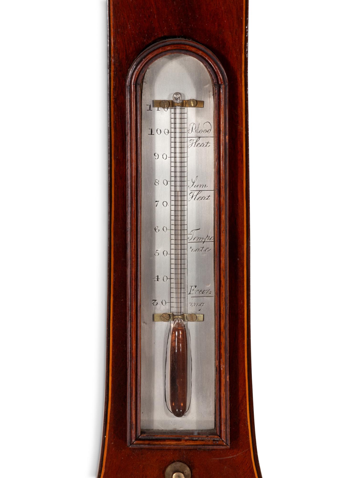 A George III Mahogany and Marquetry Wheel Barometer