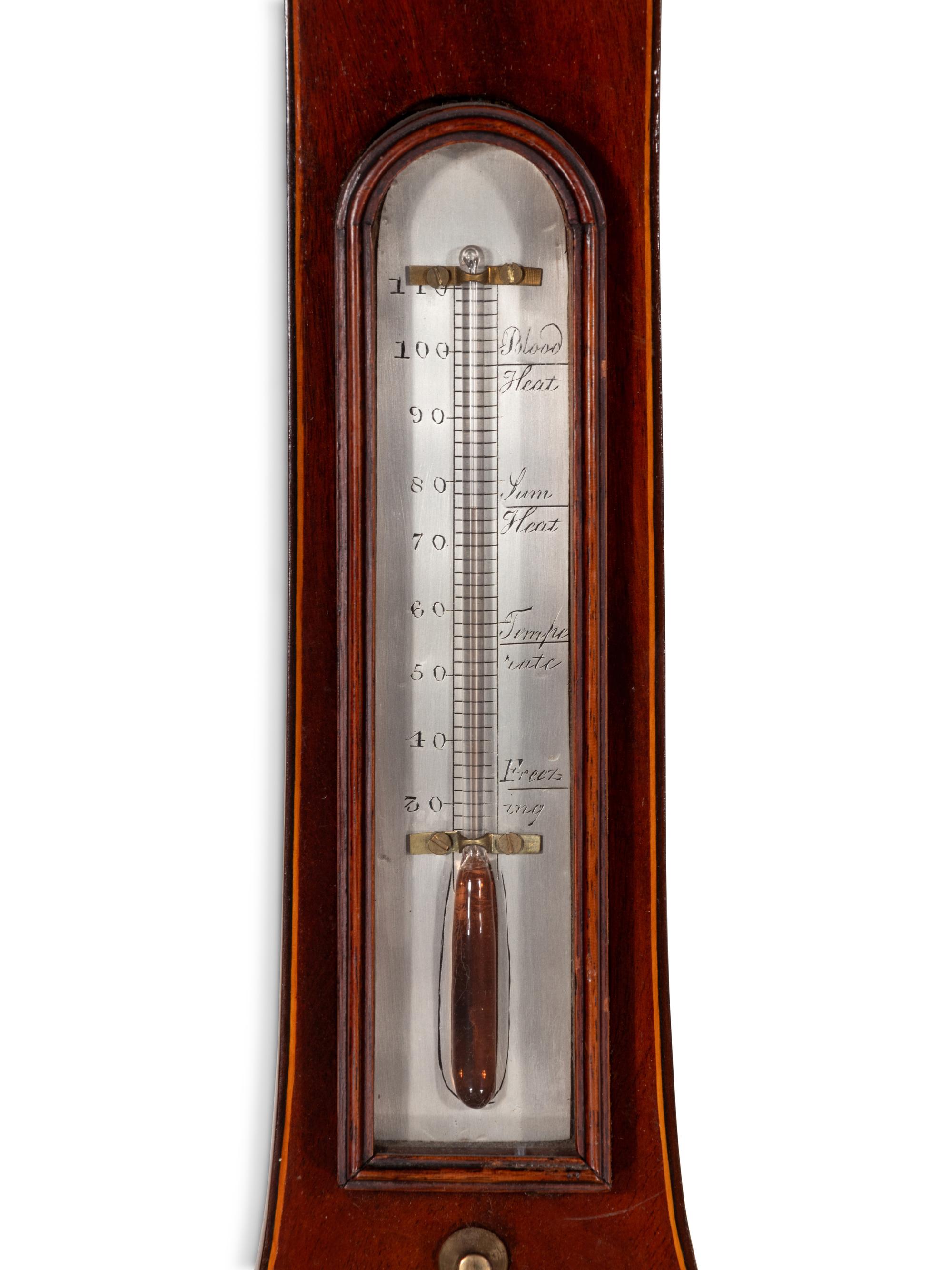A George III Mahogany and Marquetry Wheel Barometer