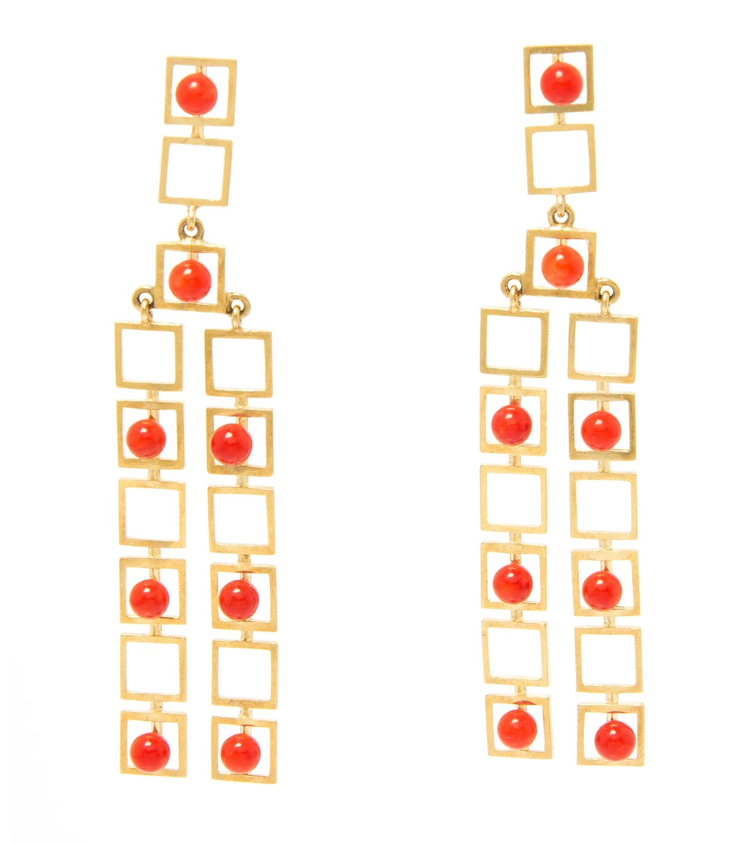 A Pair of Yellow Gold and Coral Dangle Earrings, 7.20 dwts.