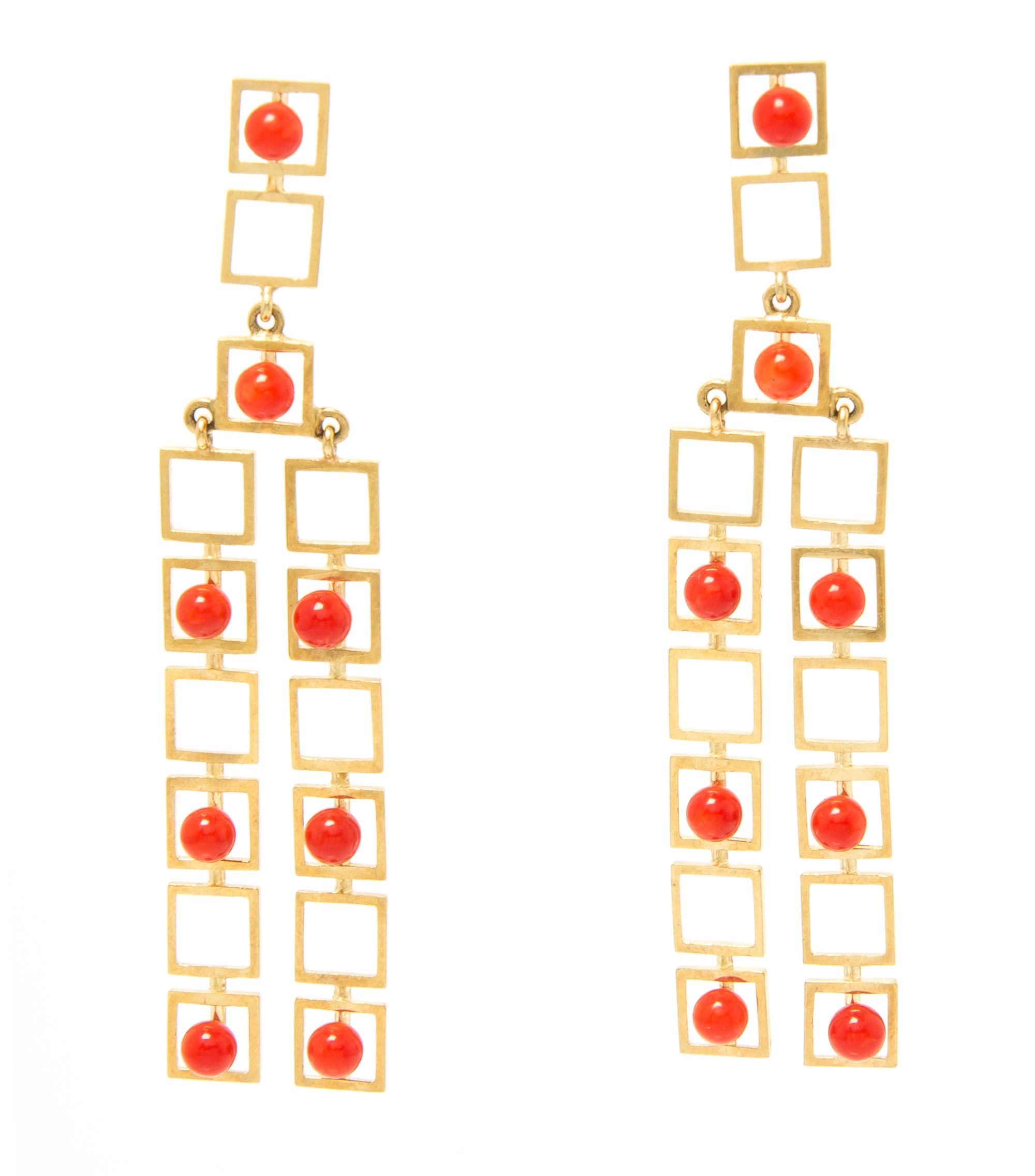 A Pair of Yellow Gold and Coral Dangle Earrings, 7.20 dwts.