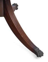 A Regency Style Satinwood Banded Mahogany Triple-Pedestal Dining Table