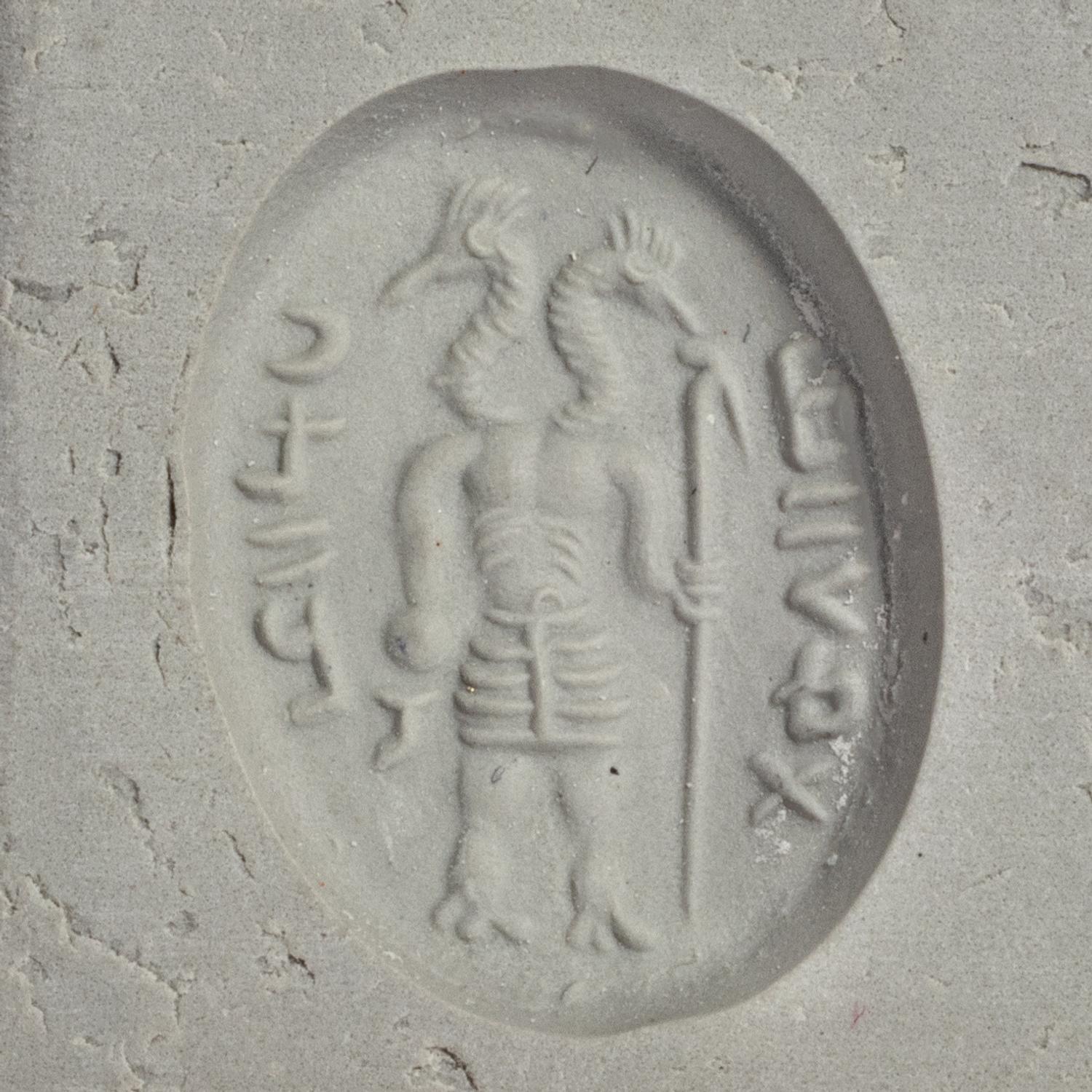A Sassanian Agate Ring Stone with a Double-Headed Deity