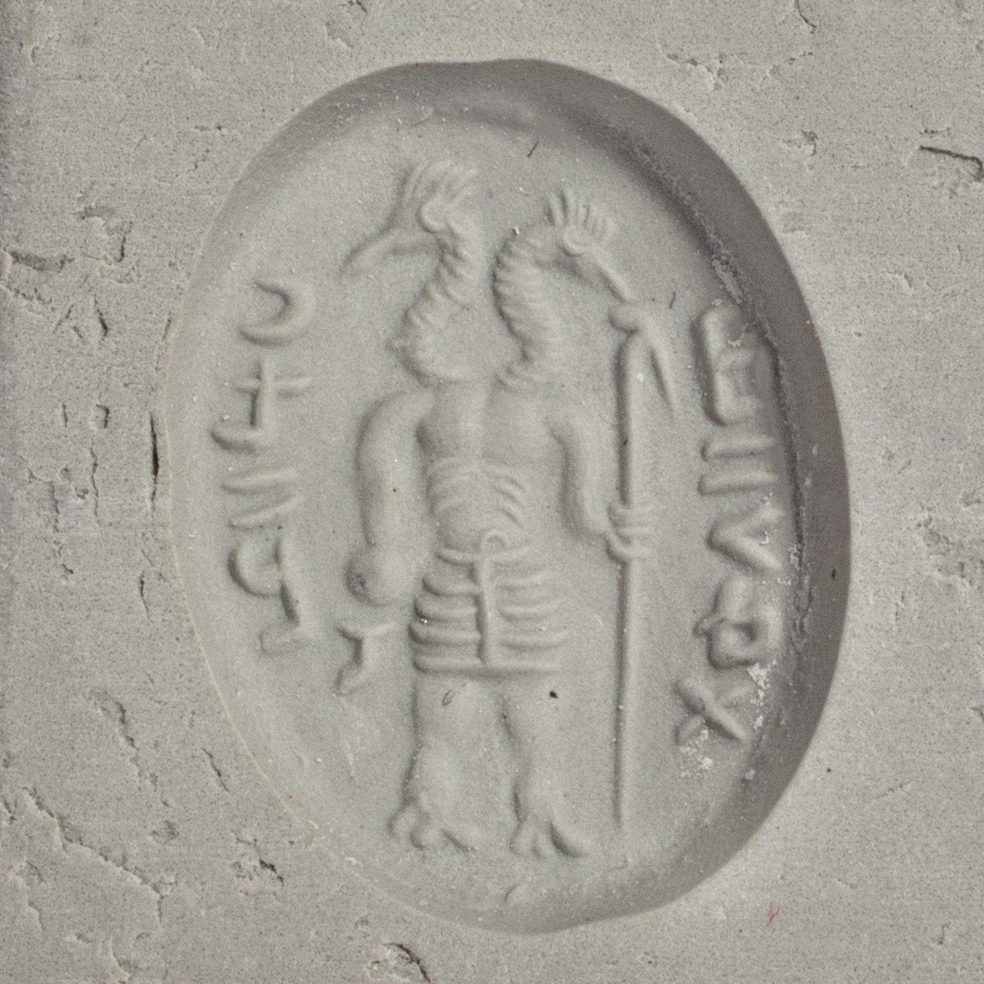 A Sassanian Agate Ring Stone with a Double-Headed Deity