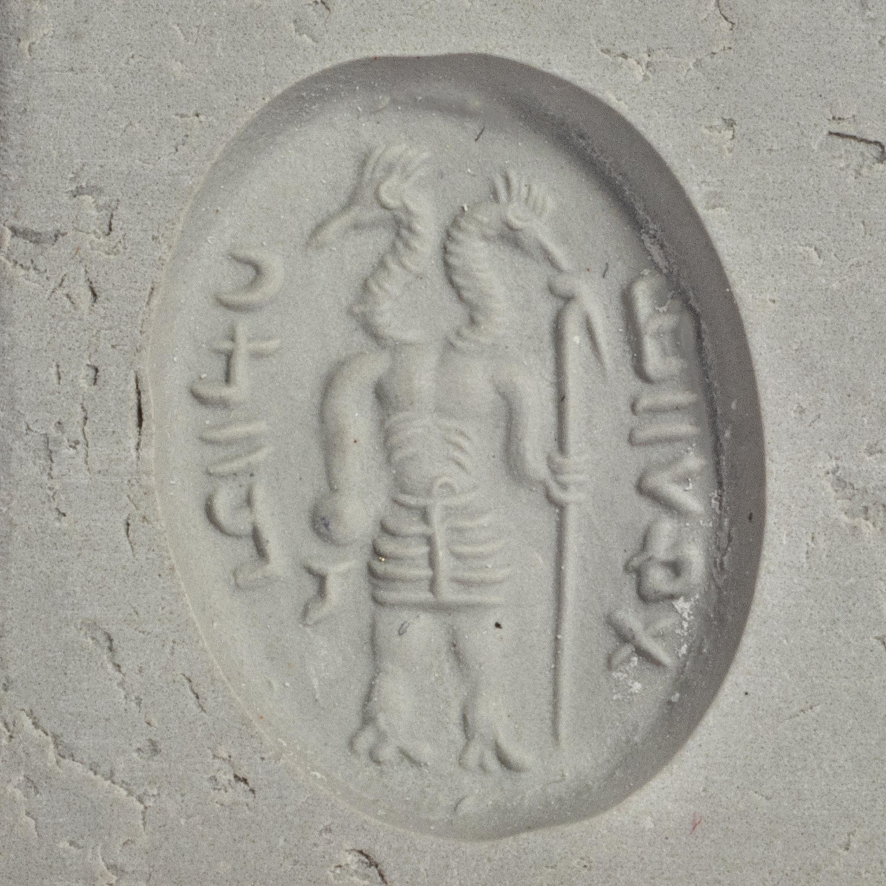 A Sassanian Agate Ring Stone with a Double-Headed Deity
