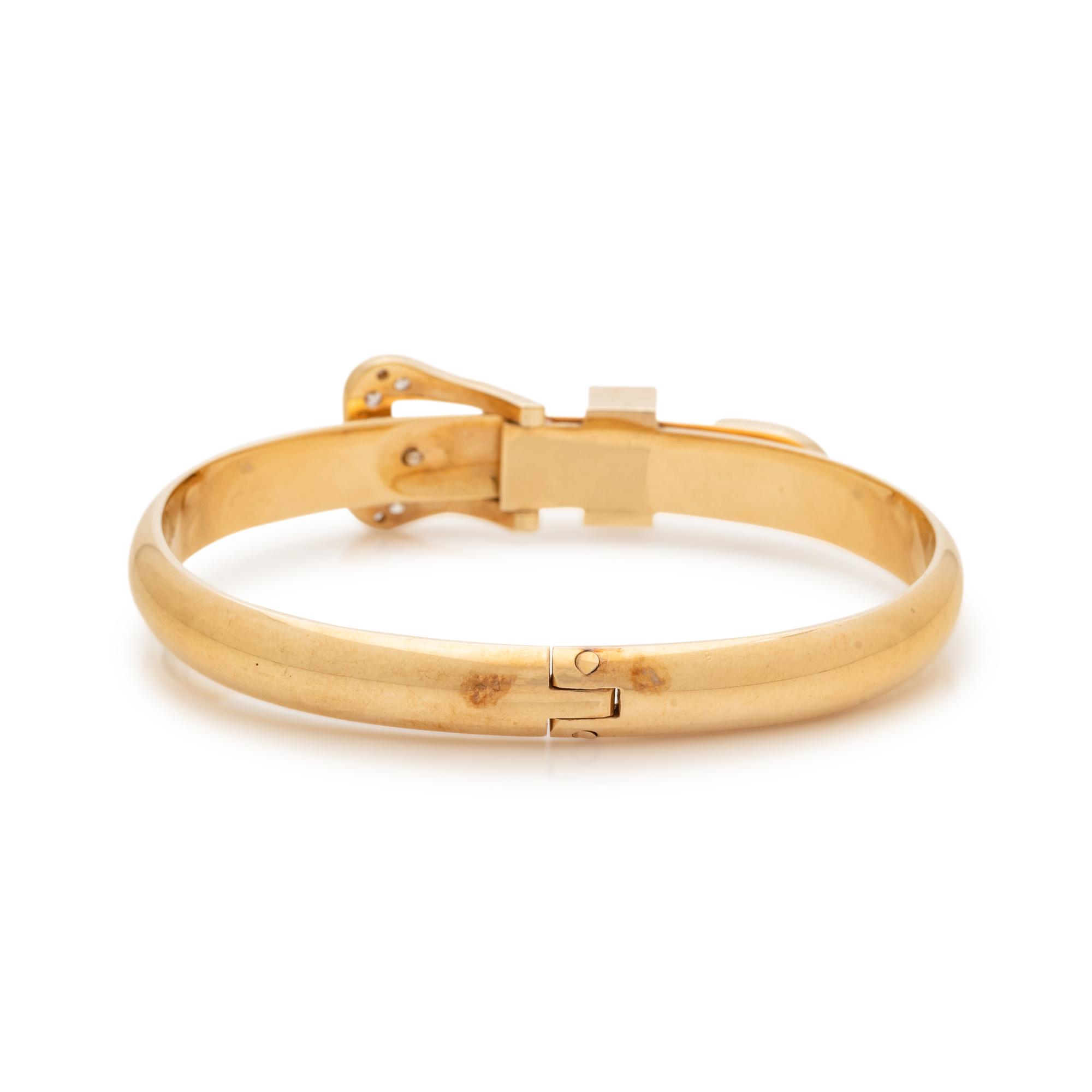 YELLOW GOLD AND DIAMOND BELT MOTIF BANGLE BRACELET