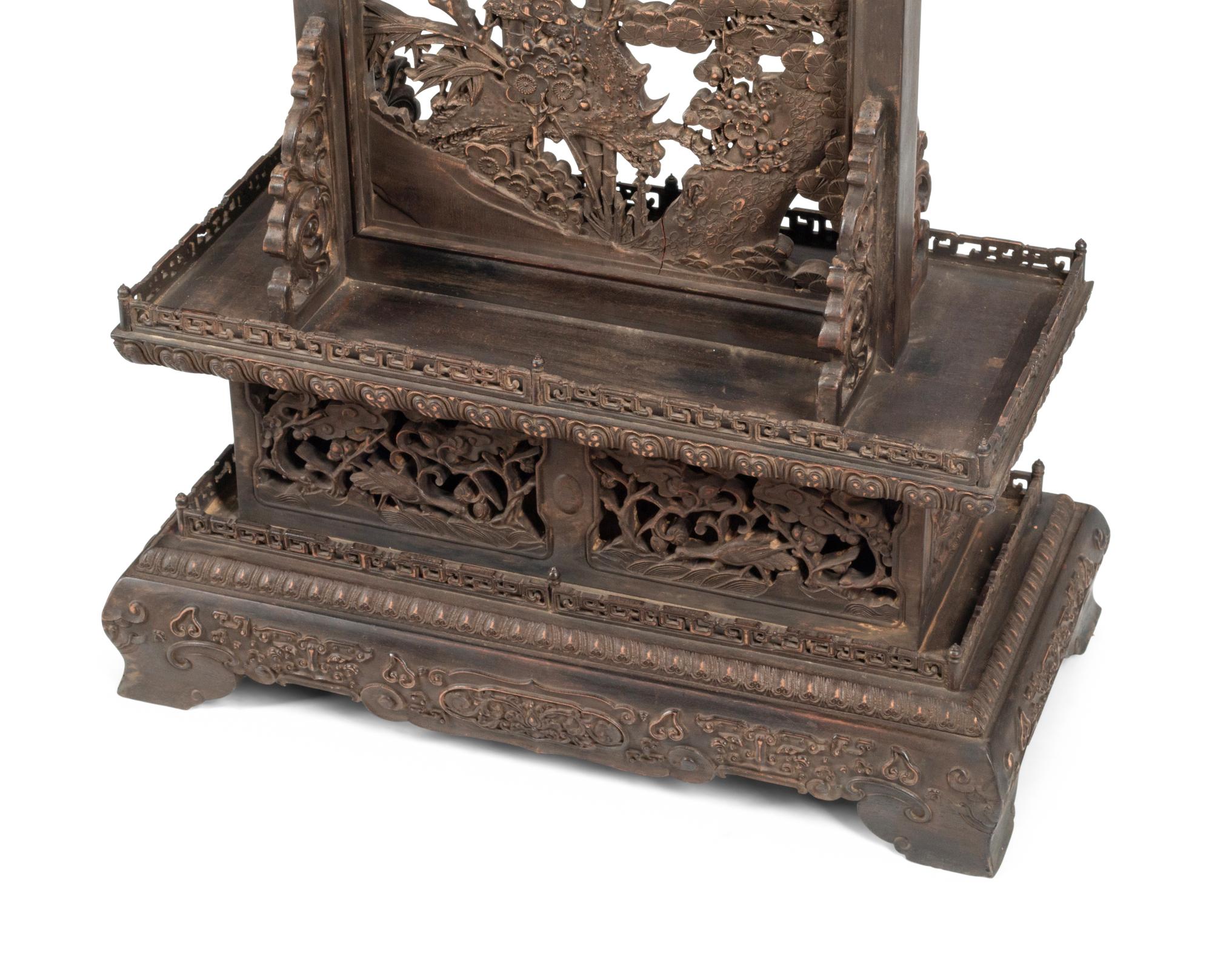 A Chinese Inlaid Circular Plaque on a Wood Base