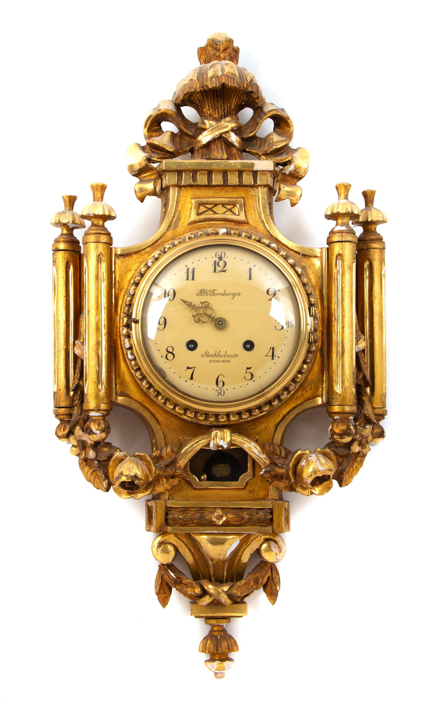 A Swedish Giltwood Cartel Clock Height 26 inches. — F. W. TORNBERG, 20TH CENTURY