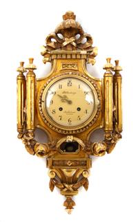 A Swedish Giltwood Cartel Clock Height 26 inches. — F. W. TORNBERG, 20TH CENTURY