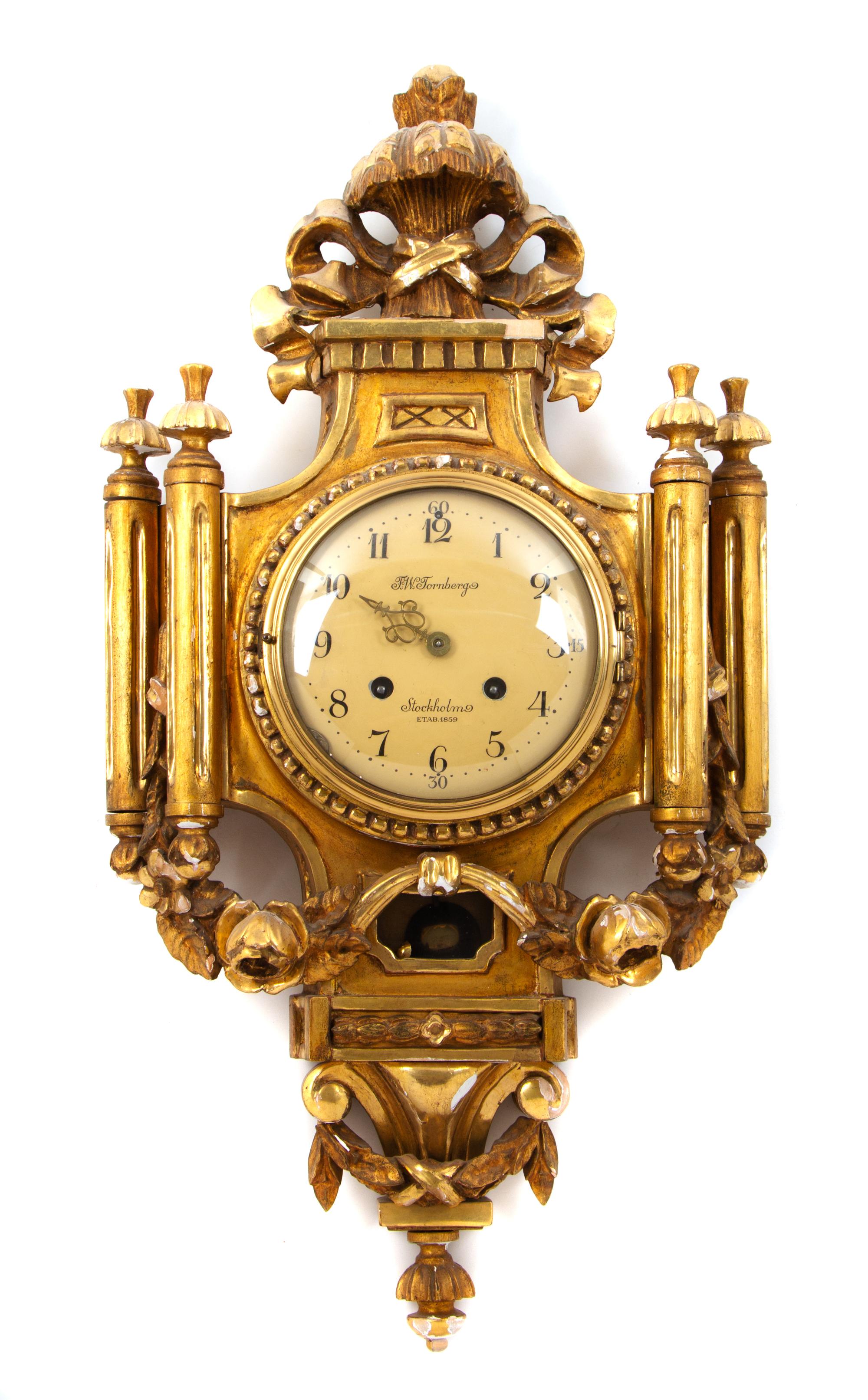 A Swedish Giltwood Cartel Clock Height 26 inches. — F. W. TORNBERG, 20TH CENTURY
