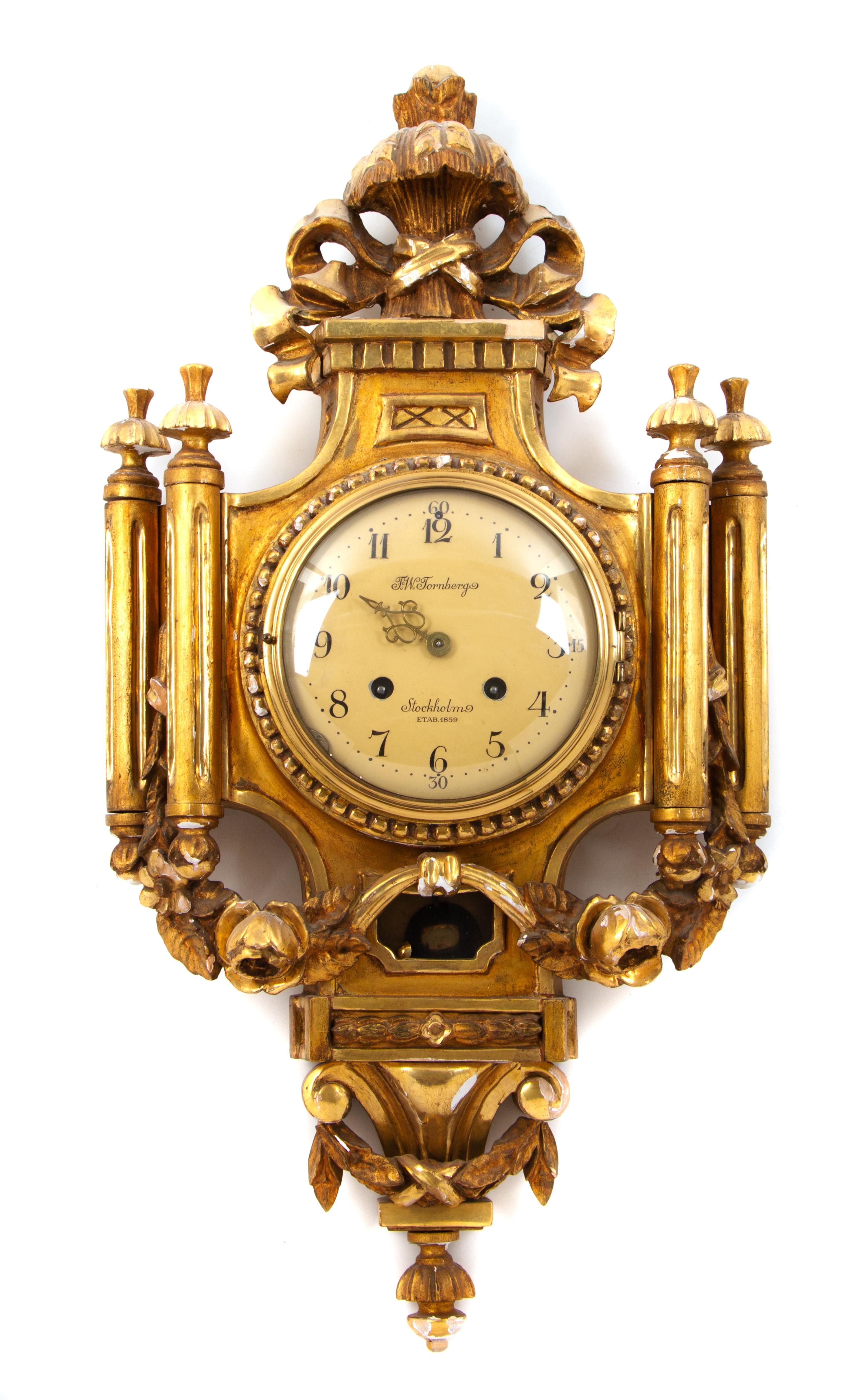 A Swedish Giltwood Cartel Clock Height 26 inches. — F. W. TORNBERG, 20TH CENTURY