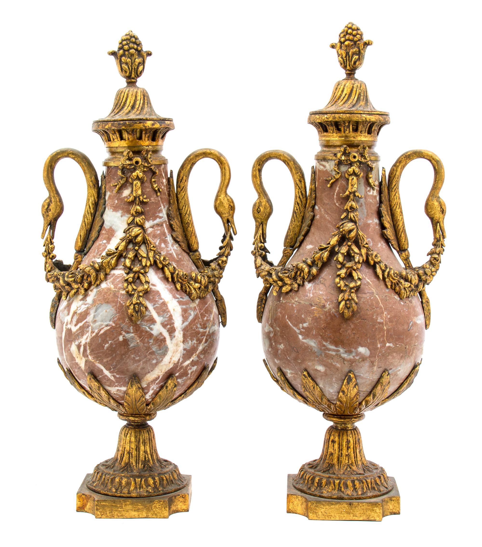 A Pair of Neoclassical Rouge Marble and Gilt Bronze Mounted Urns, Height 21 inches.