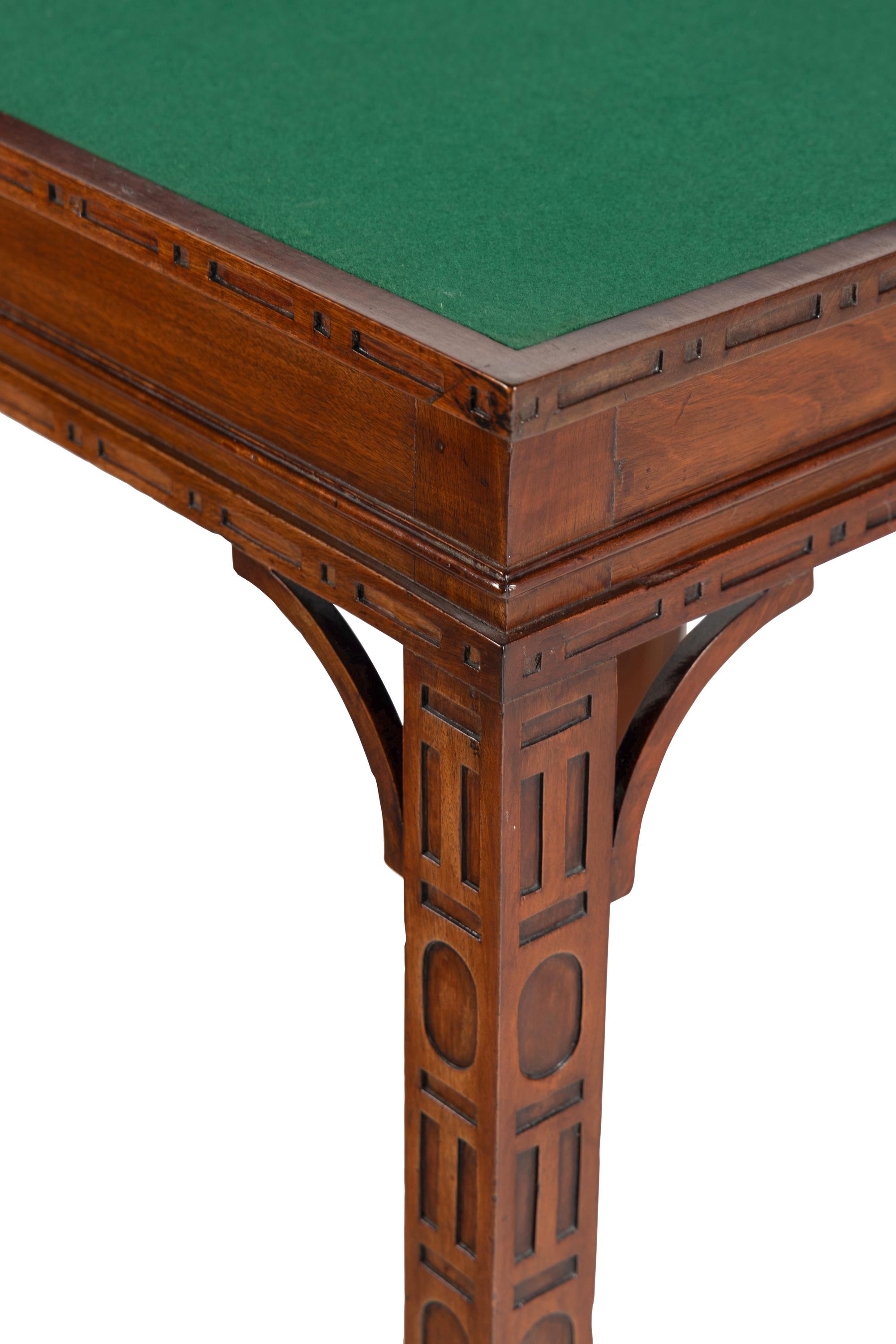 A George III Mahogany Blind Fret Carved Flip-Top Table