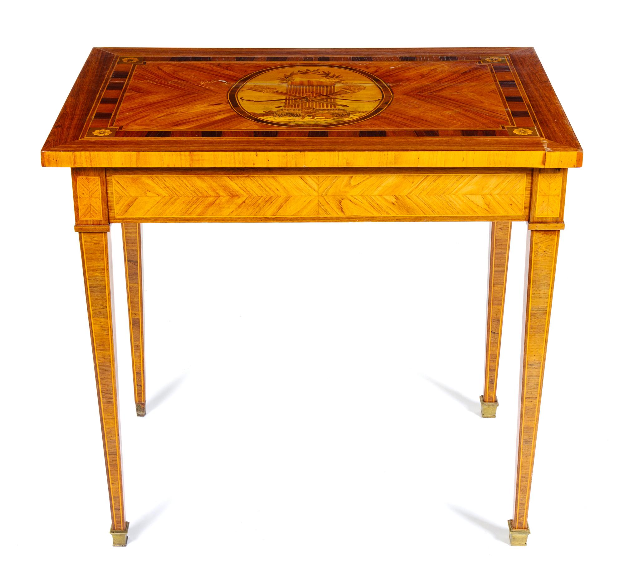 A Louis XVI Style Marquetry Table Height 29 x width 32 x depth 21 1/2 inches. — LATE 19TH CENTURY