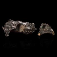A Chinese Patinated and Parcel-gilt Bronze 'Qilin and Boy' Censer, 17th/18th Century 清早期 銅局部鎏金麒麟童子香薰