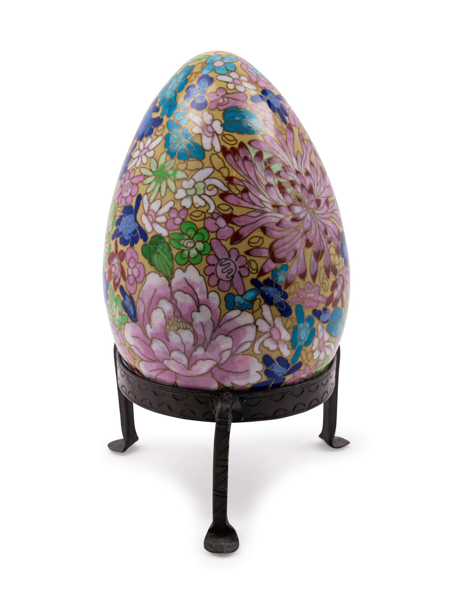 A Continental Cloisonné Enamel Egg with Stand