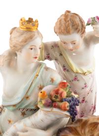 A Meissen Porcelain Group of Cybele Attended by Four Putti