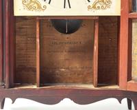 A Federal Mahogany and Églomisé Shelf Clock