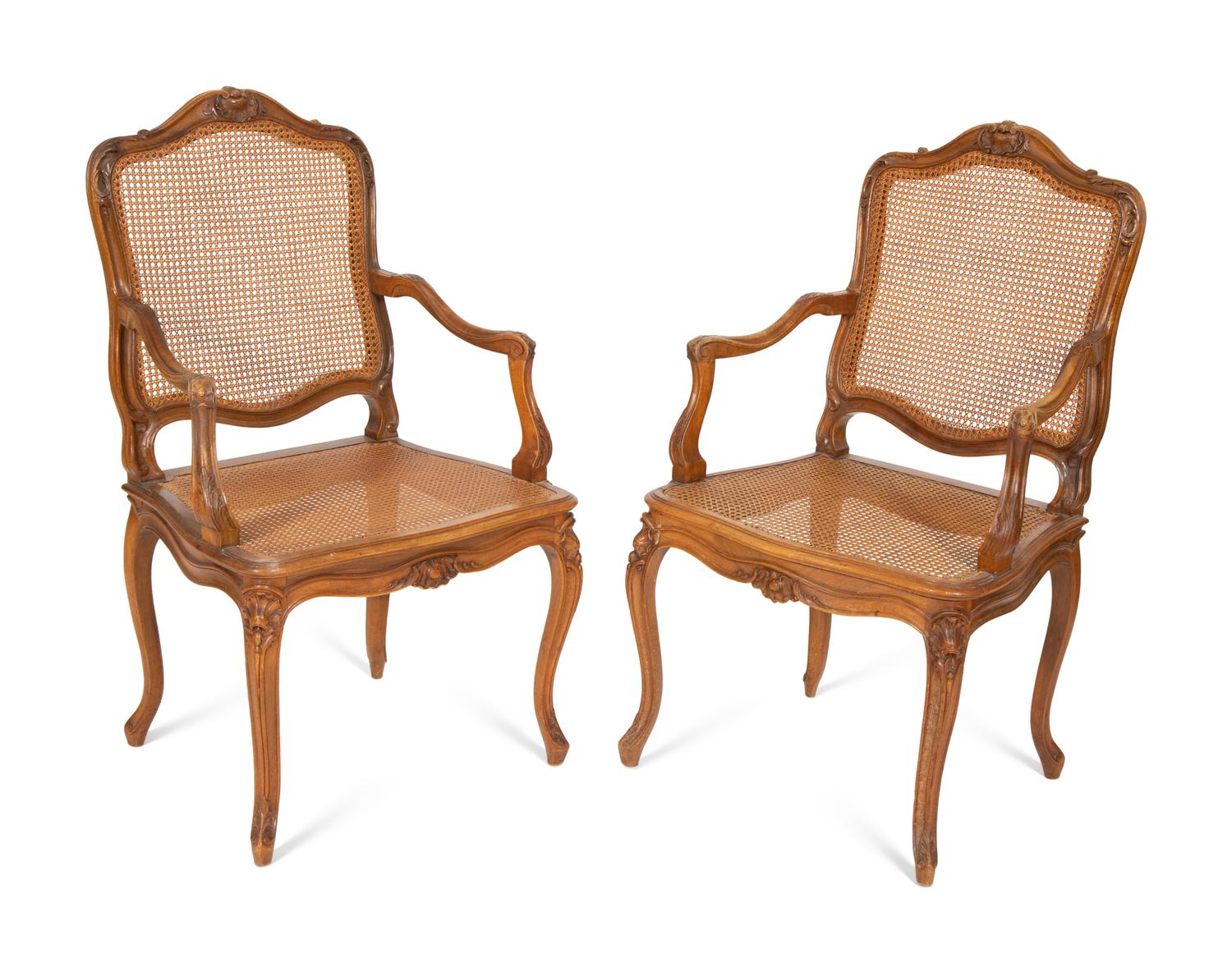 A Pair of Louis XV Style Caned Beechwood Fauteuils