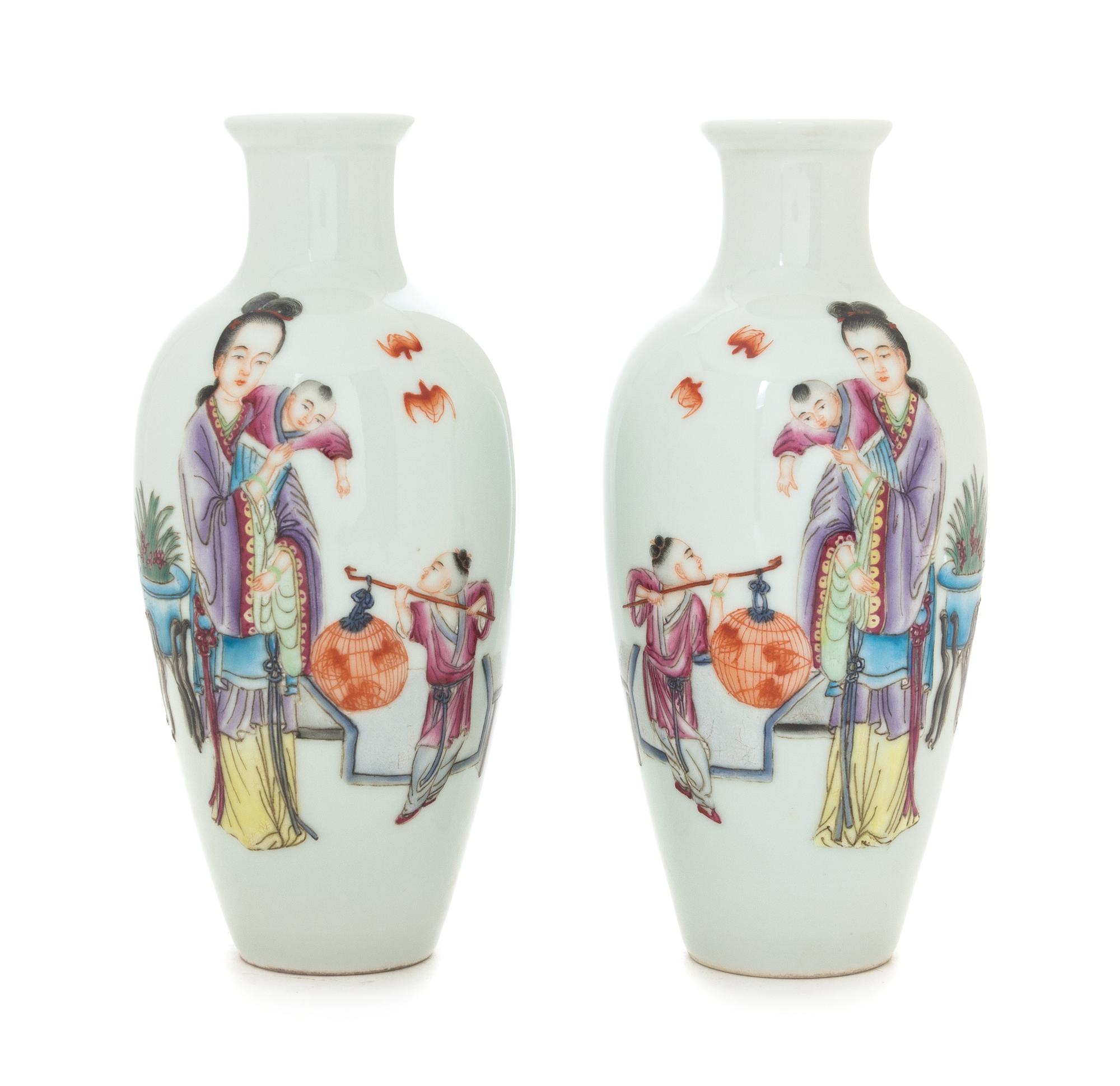 A Pair of Famille Rose Porcelain Vases Height of each 7 1/4 inches.