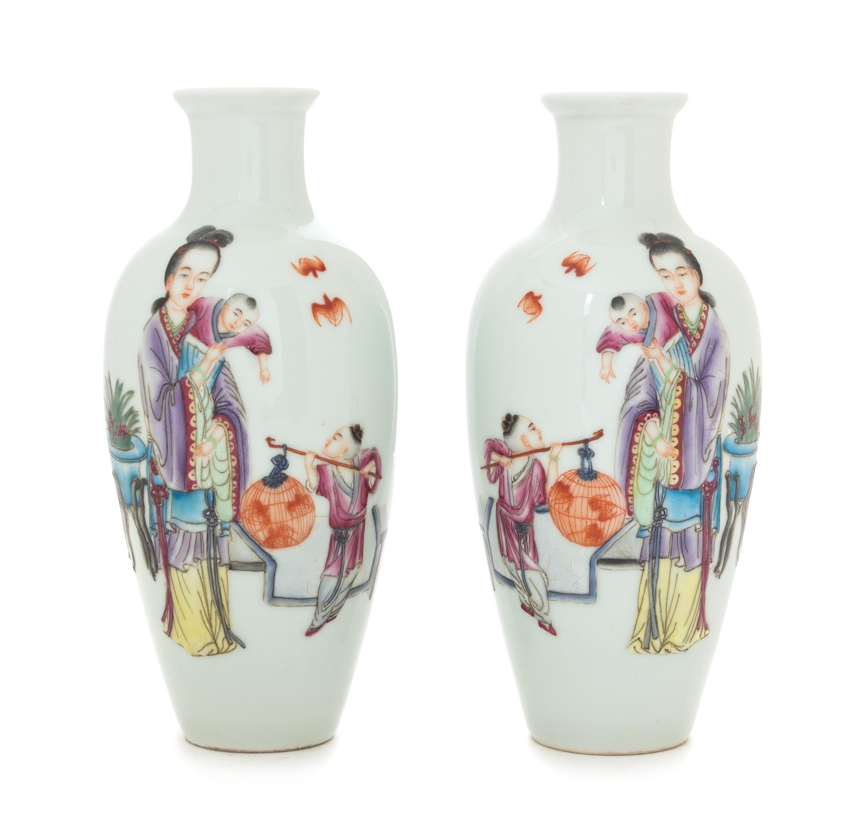 A Pair of Famille Rose Porcelain Vases Height of each 7 1/4 inches.