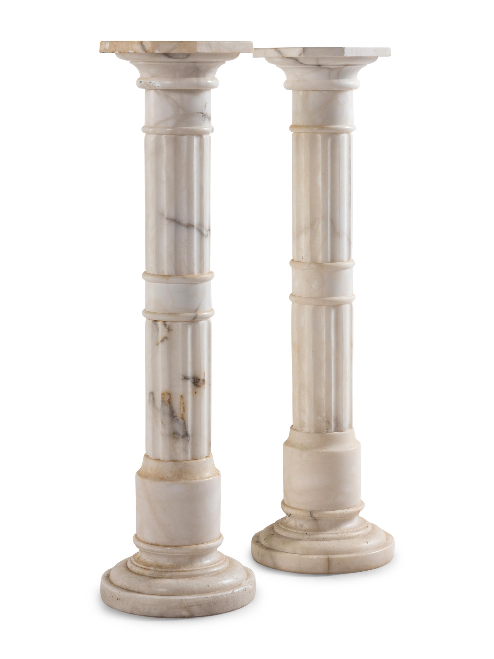 A Pair of Continental Marble Pedestals