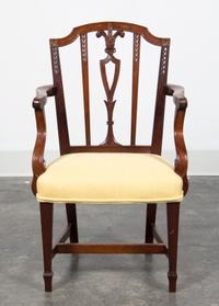 A Mahogany Child's Open Armchair Height 26 3/4 inches. — 20TH CENTURY