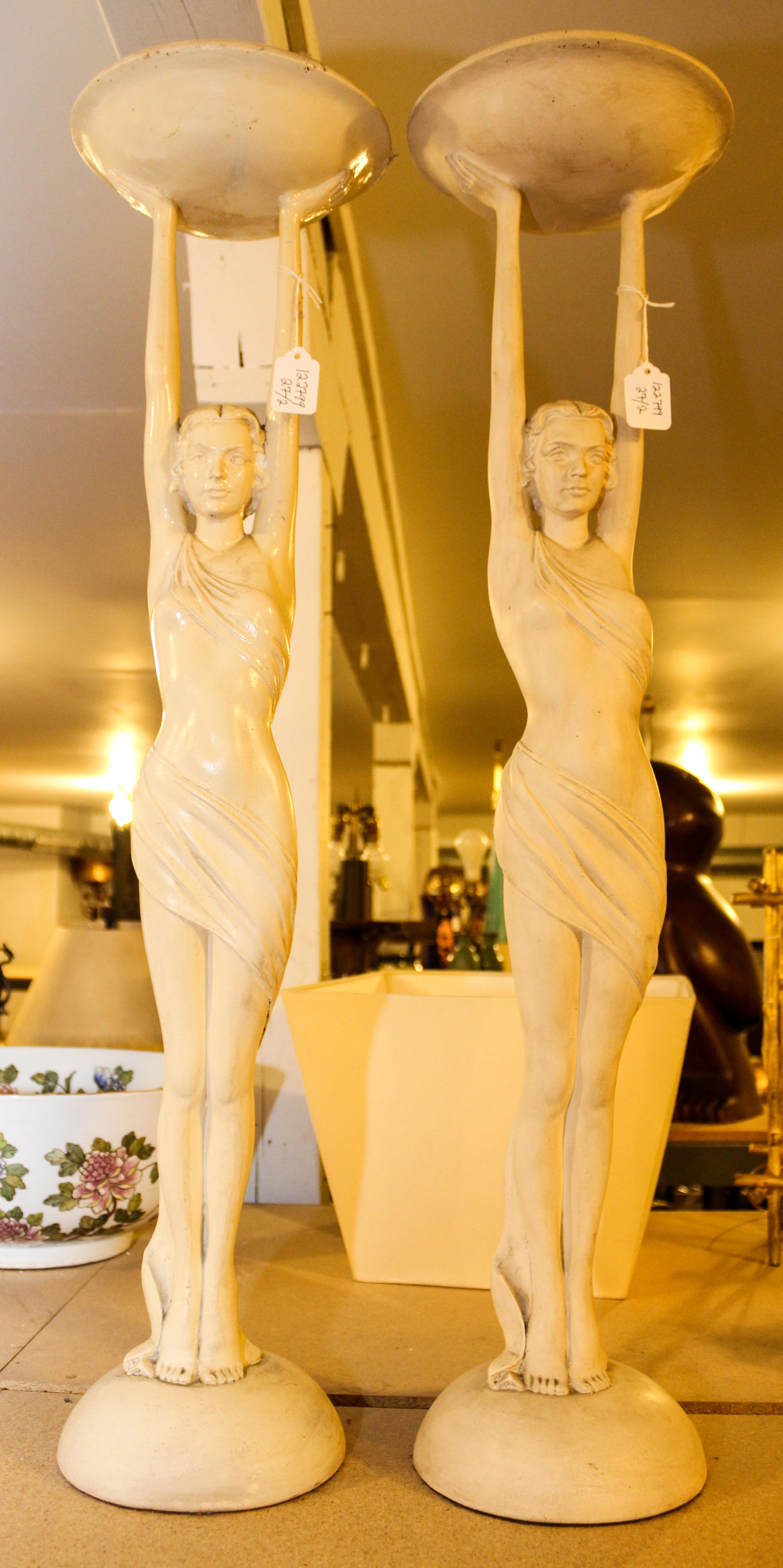 A Pair of Art Deco Plaster Figural Stands Height 33 inches (of tallest). — 20TH CENTURY