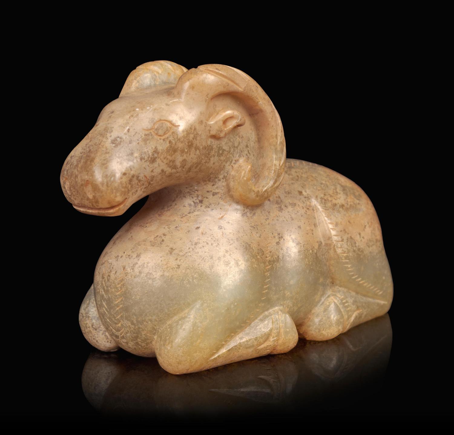 A Calcified Jade Figure of a Ram