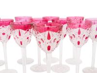 A Set of Twelve Baccarat Cranberry Cut-to-Clear Hock Wine Glasses