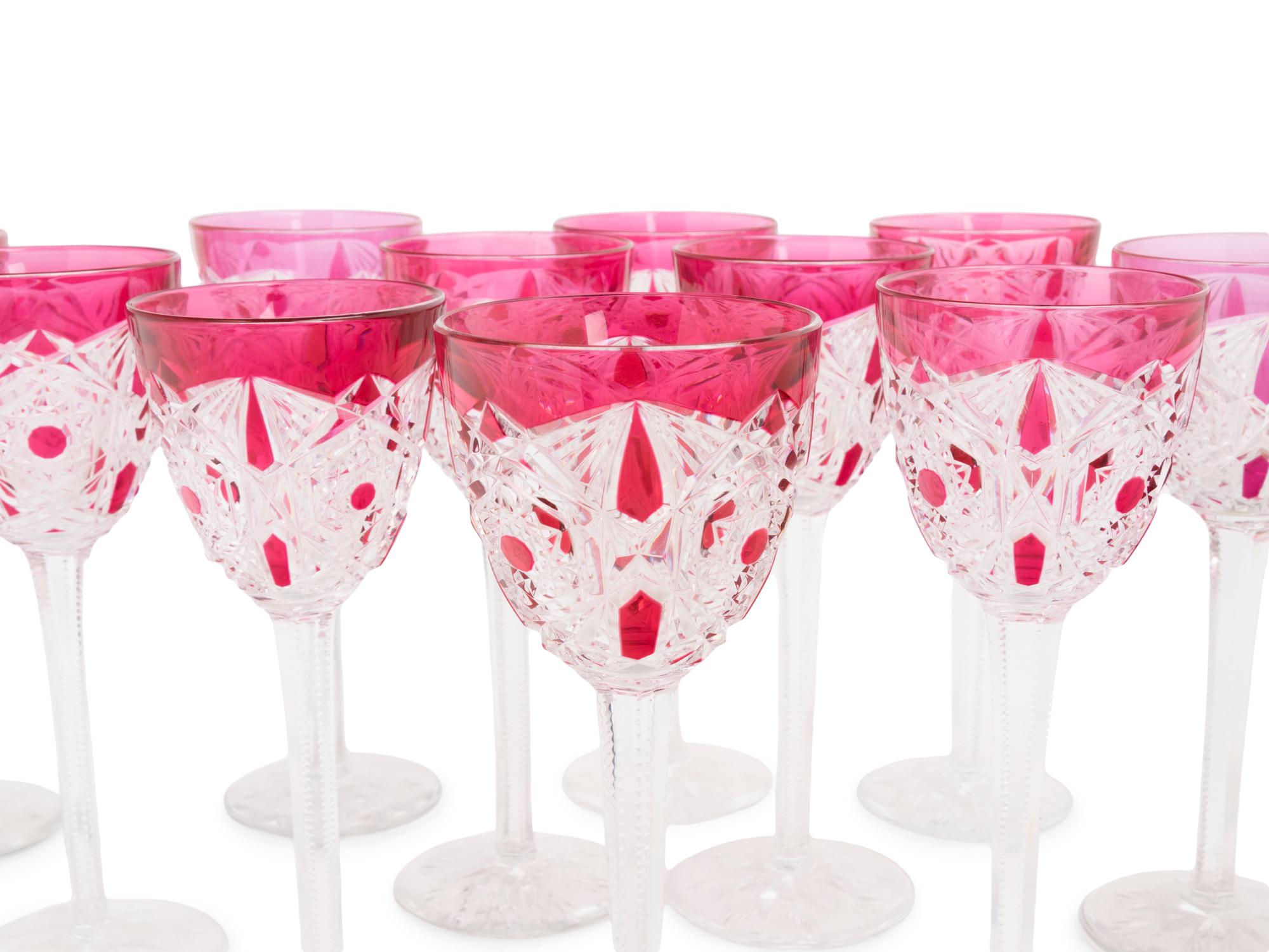 A Set of Twelve Baccarat Cranberry Cut-to-Clear Hock Wine Glasses