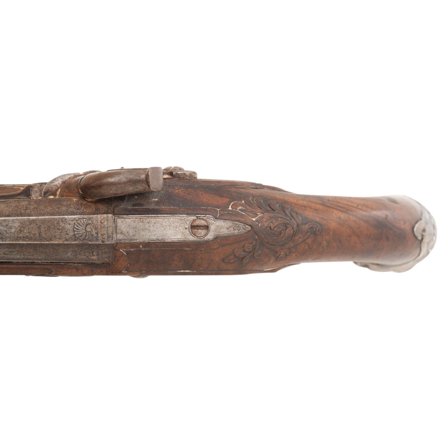 A Pair of Silver Mounted French Percussion Pistols