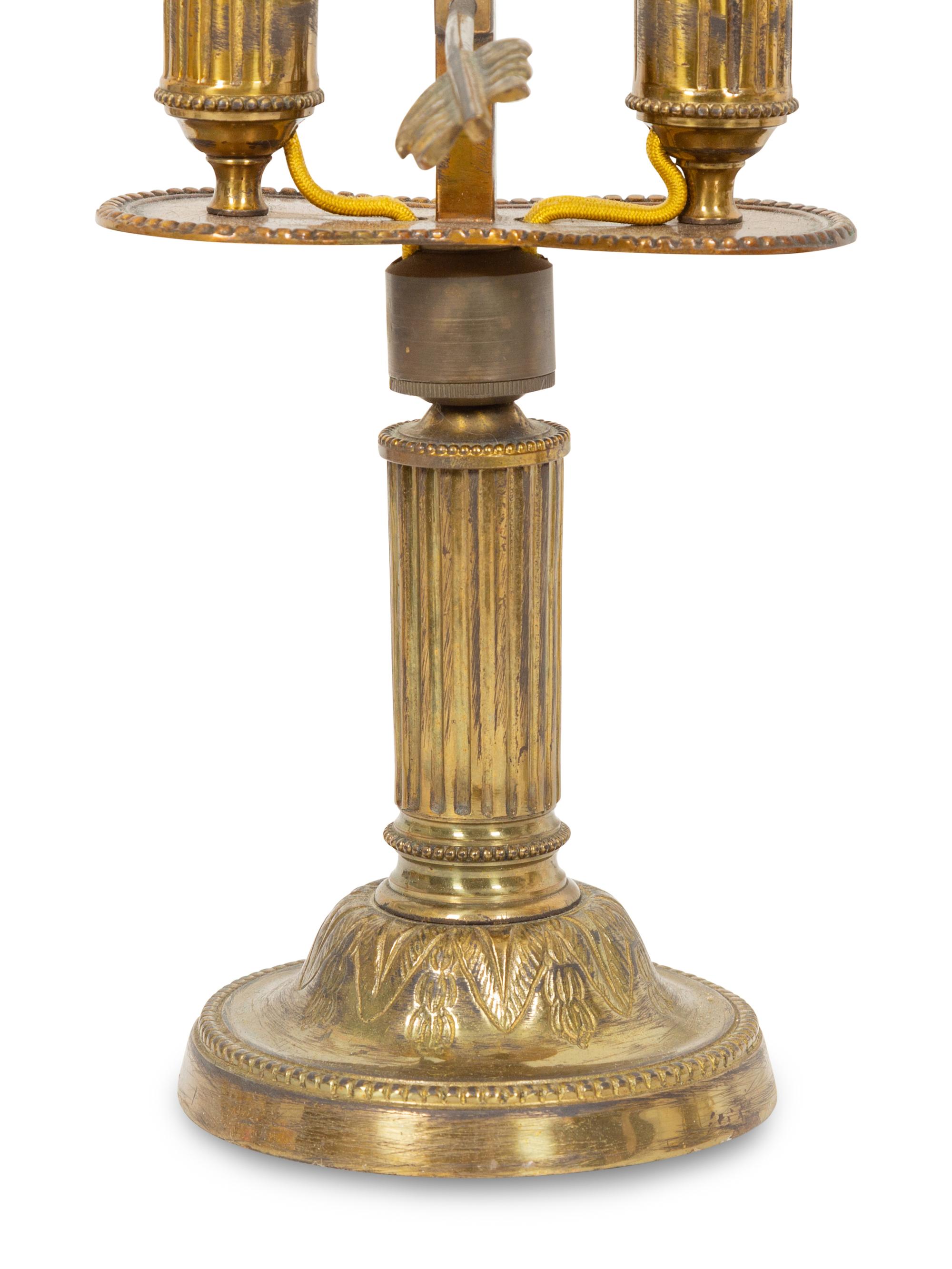 A Pair of French Gilt Metal Bouillotte Lamps with Green Tôle Peinte Shades