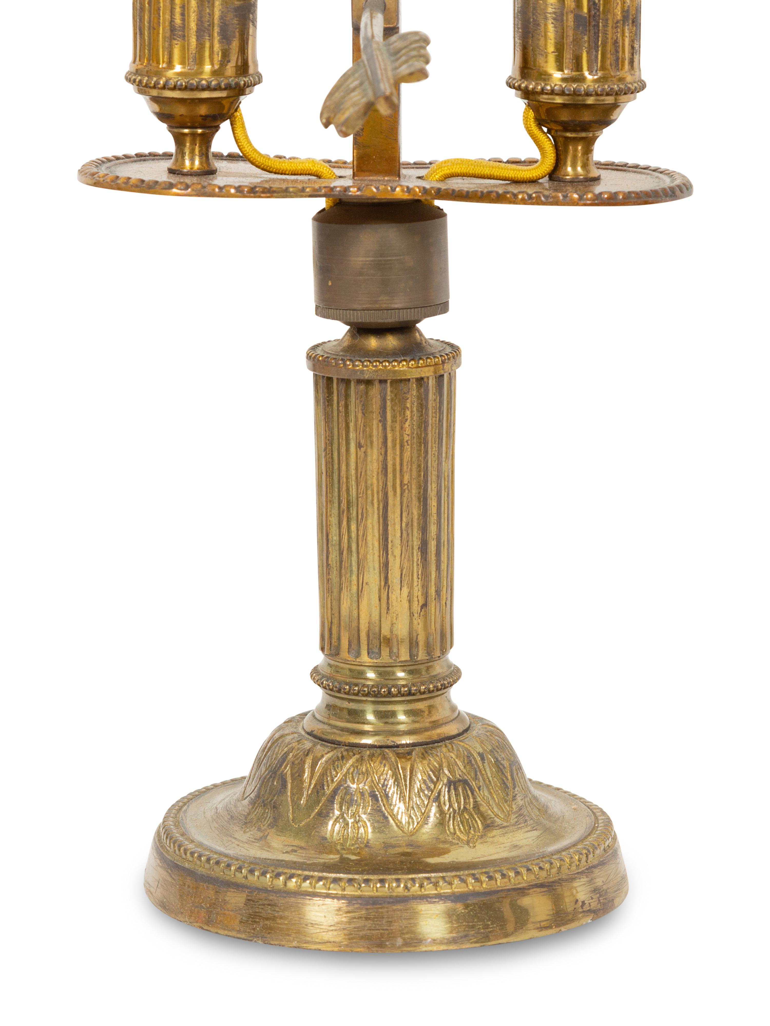 A Pair of French Gilt Metal Bouillotte Lamps with Green Tôle Peinte Shades