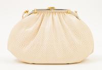 A Judith Leiber Ivory Snakeskin Clutch, 9.5" x 6" x 1.5".