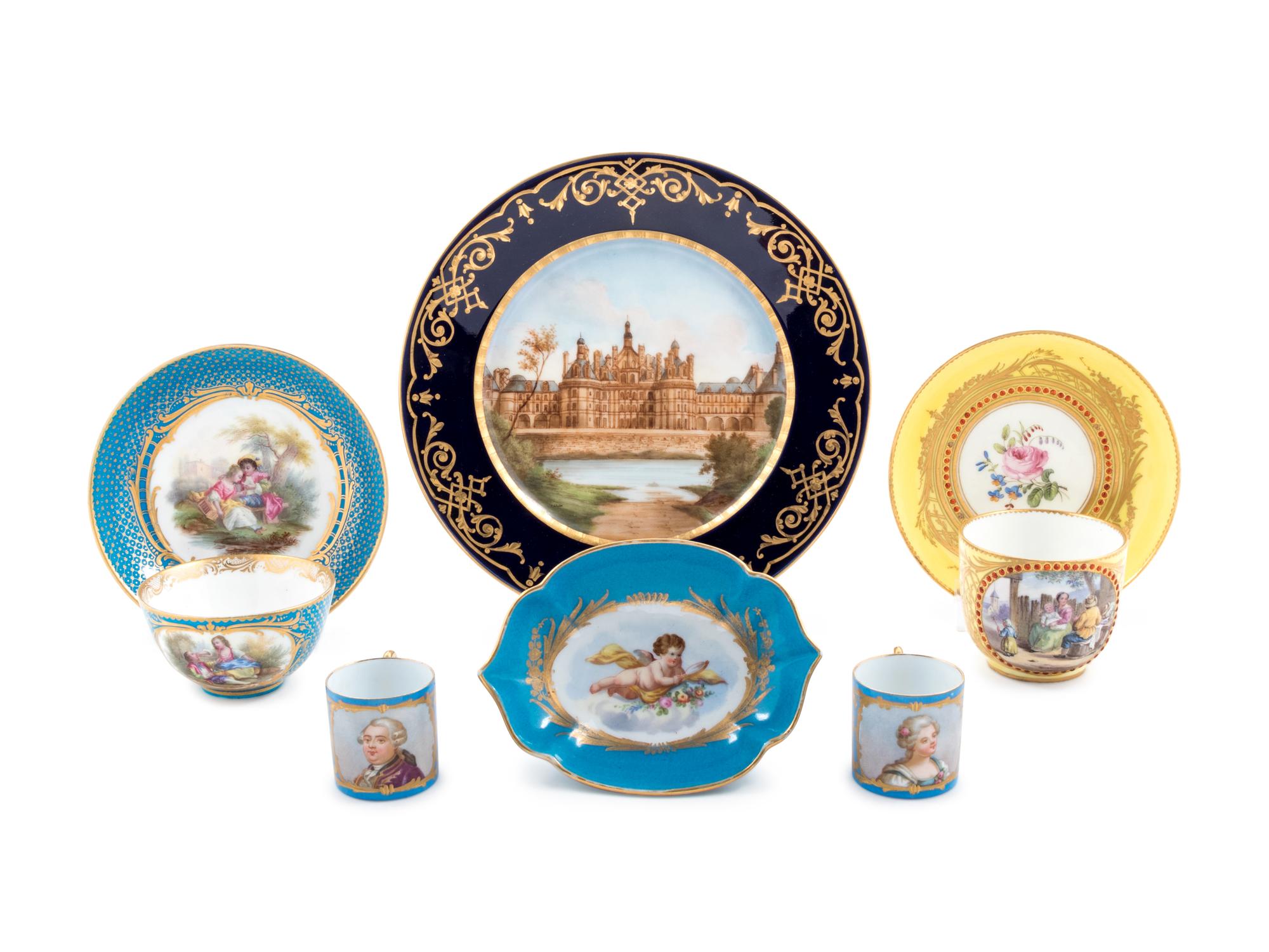 Eight Sèvres Style Painted and Parcel Gilt Porcelain Articles
