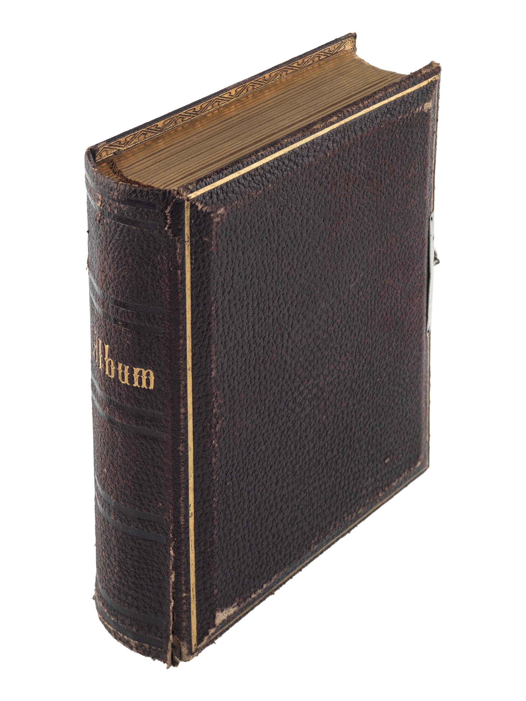 [EARLY PHOTOGRAPHY - PORTRAITURE]. A group of 21 assorted daguerreotypes, ambrotypes, tintypes, and CDVs of men, women, and children, with Kenosha, WI album with tintypes, CDVs, and cabinet cards.