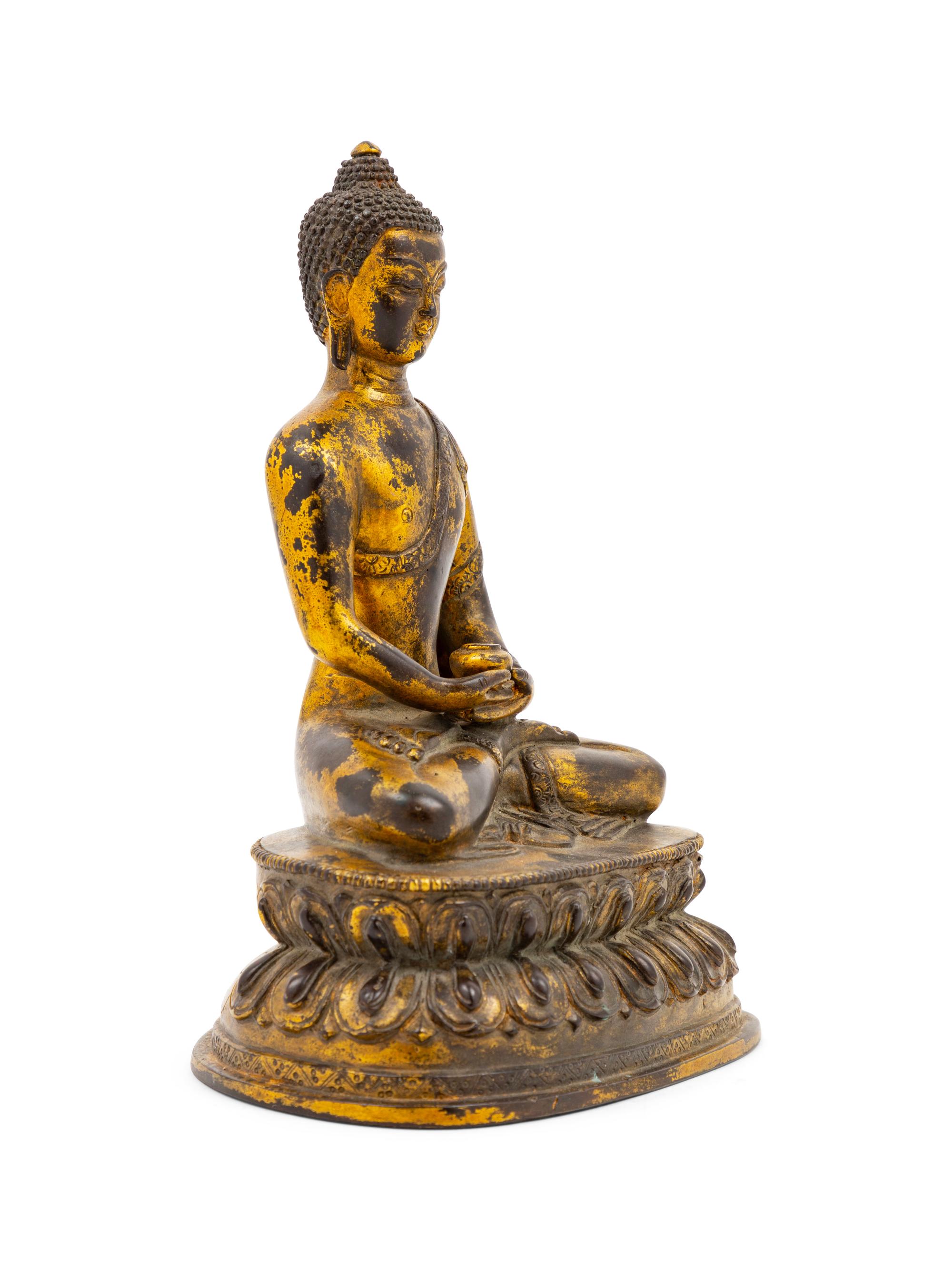 A Chinese Gilt Bronze Figure of Buddha