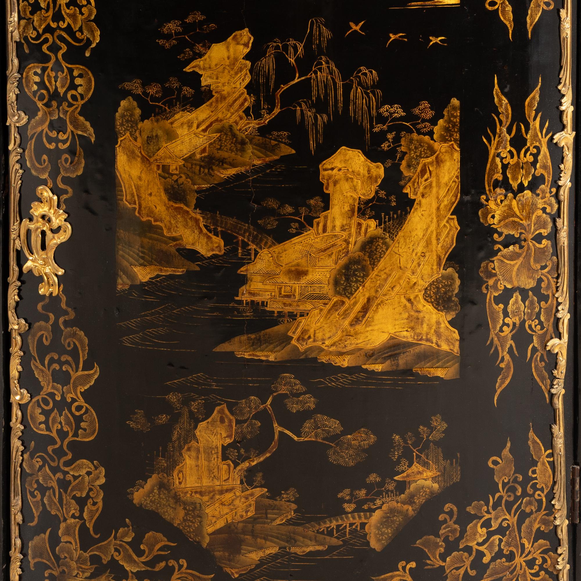 A Pair of Louis XV Chinese and European Lacquer and Gilt Bronze Mounted Encoignures