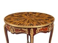 A Pair of Louis XV Style Gilt Bronze Mounted Parquetry Tables with Tiger’s Eye Tops