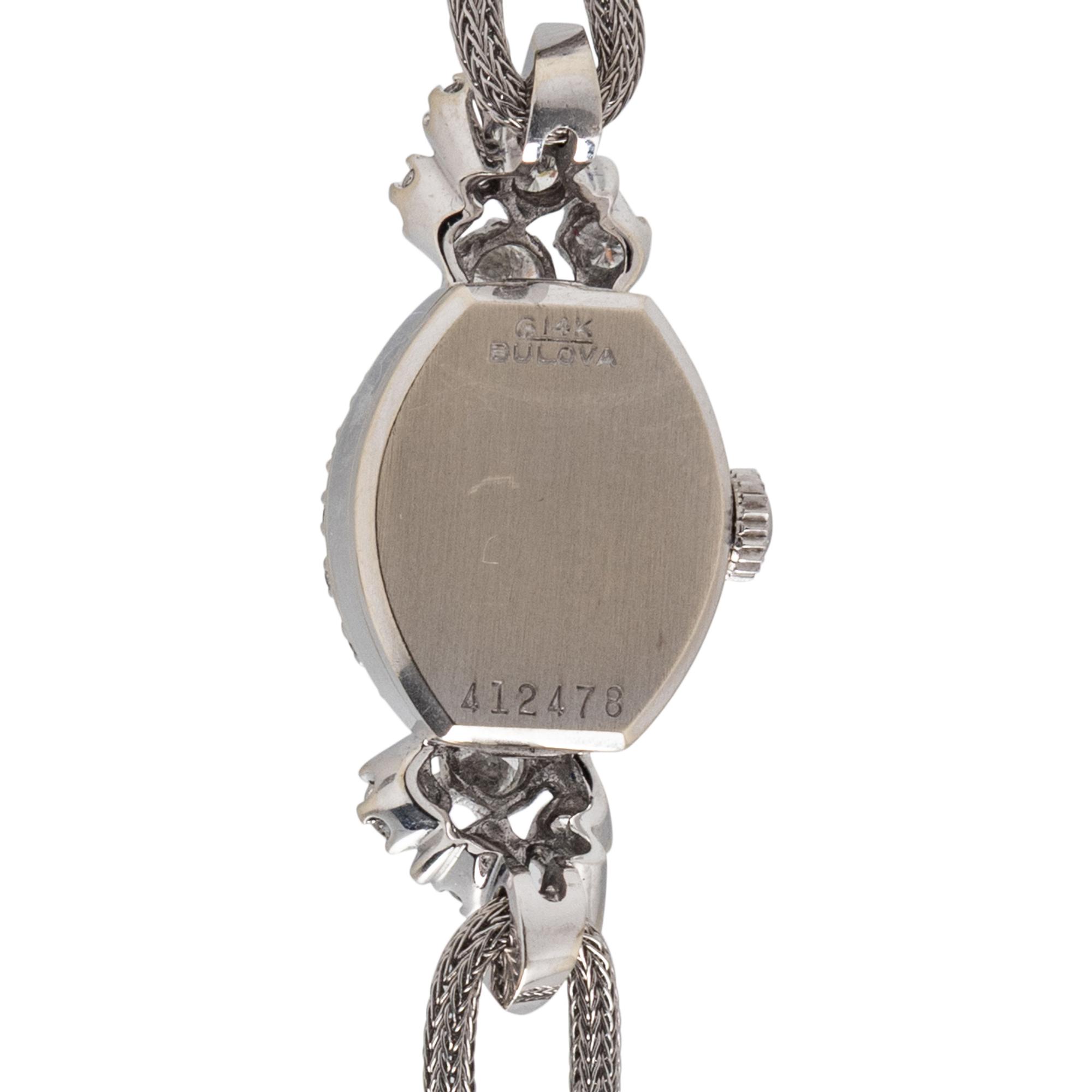 BULOVA, 14K WHITE GOLD AND DIAMOND DRESS WATCH