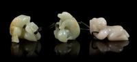 Three Carved Jade Pendants Length of longest 2 inches.