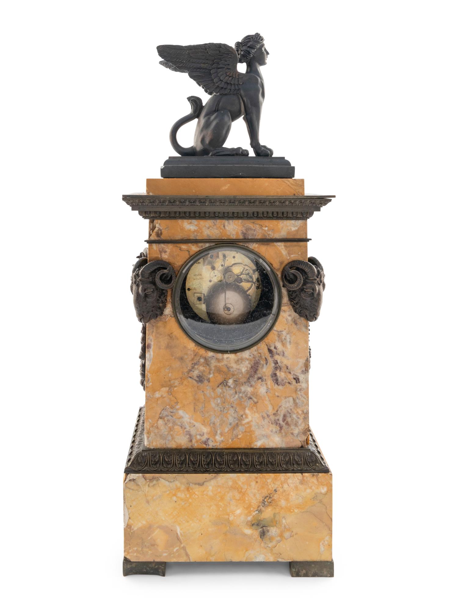 A Restauration Bronze Mounted Marble Clock