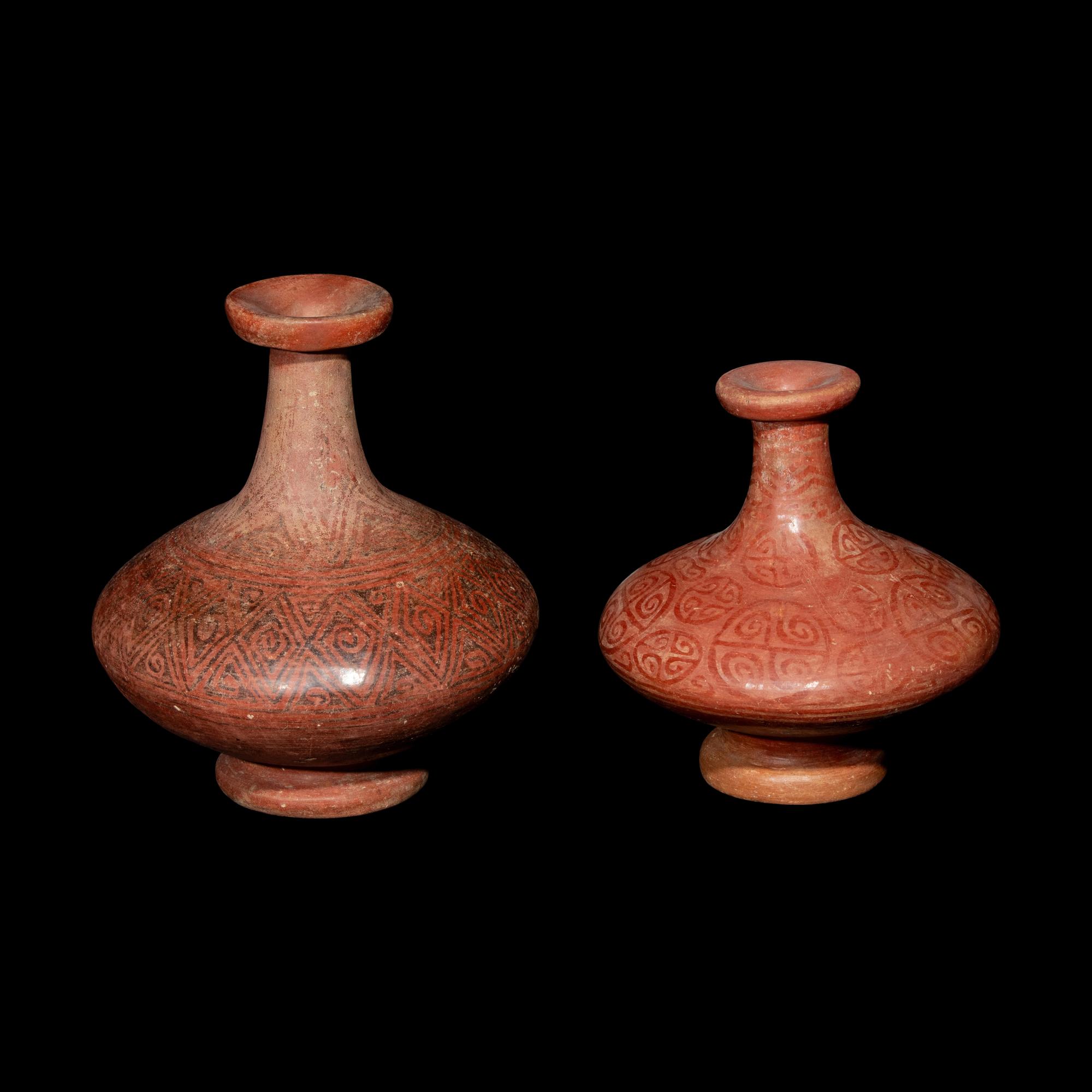 Two Capuli Polychrome Bottles