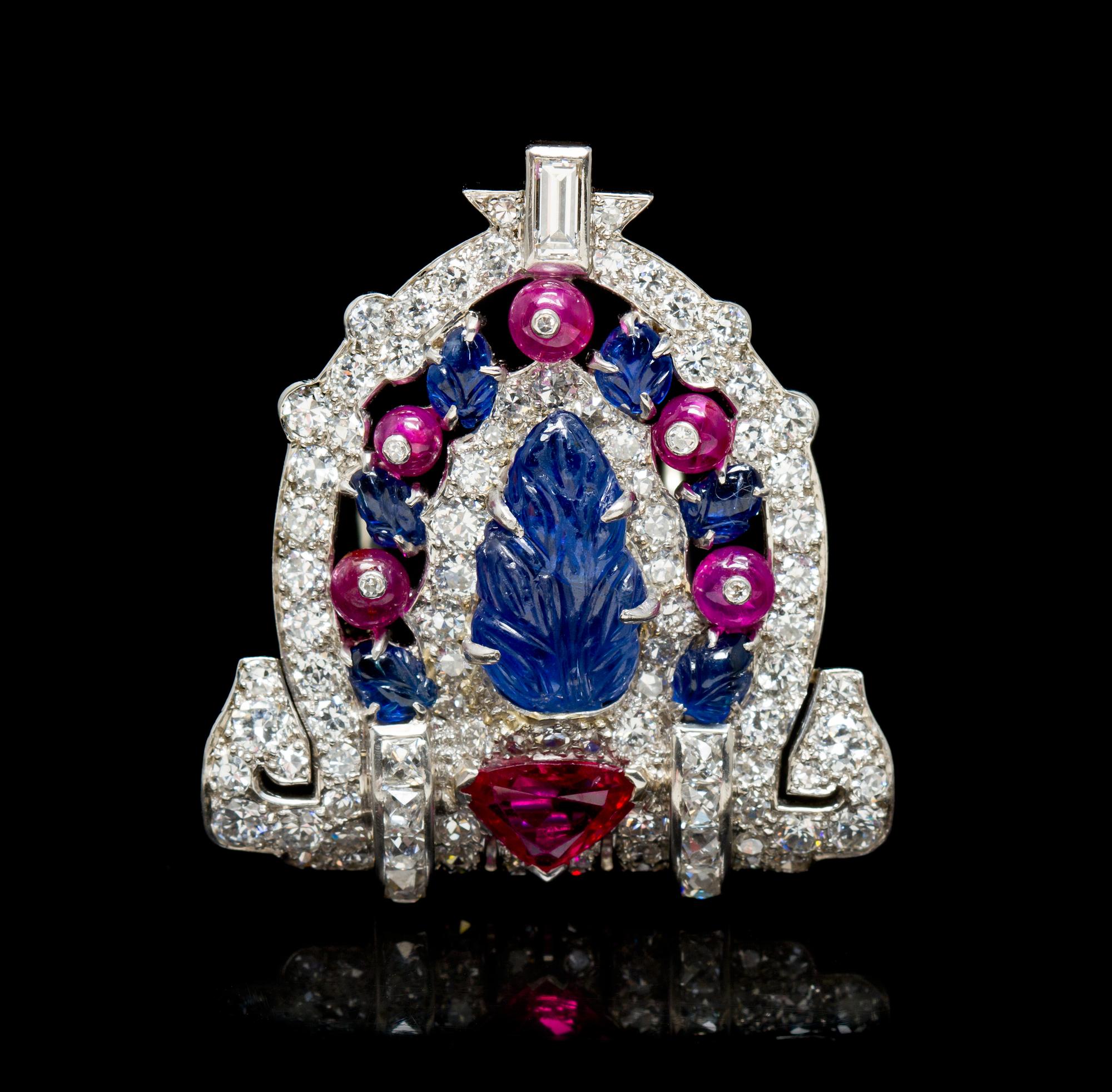 A Fine Art Deco Platinum, Sapphire, Ruby and Diamond Dress Clip, 12.90 dwts.
