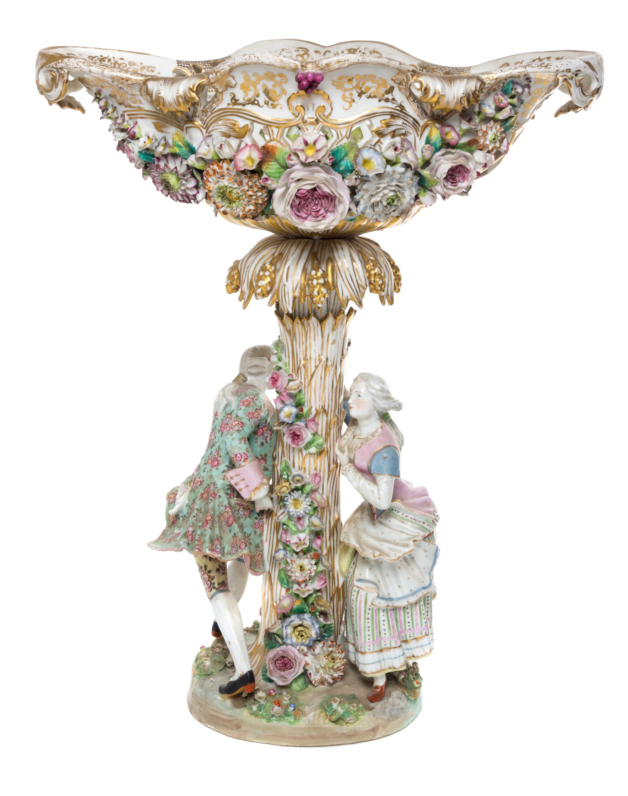 A Continental Porcelain Figural Centerpiece Height 22 inches.