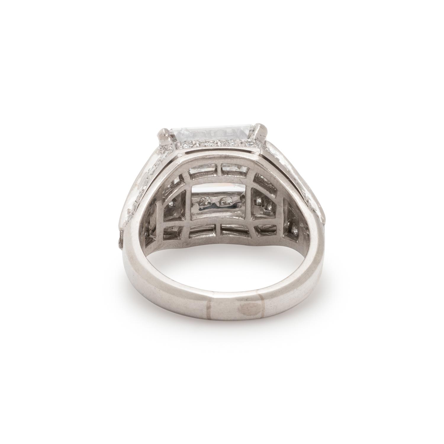 BULGARI, EMERALD CUT DIAMOND AND DIAMOND 'TROMBINO' RING