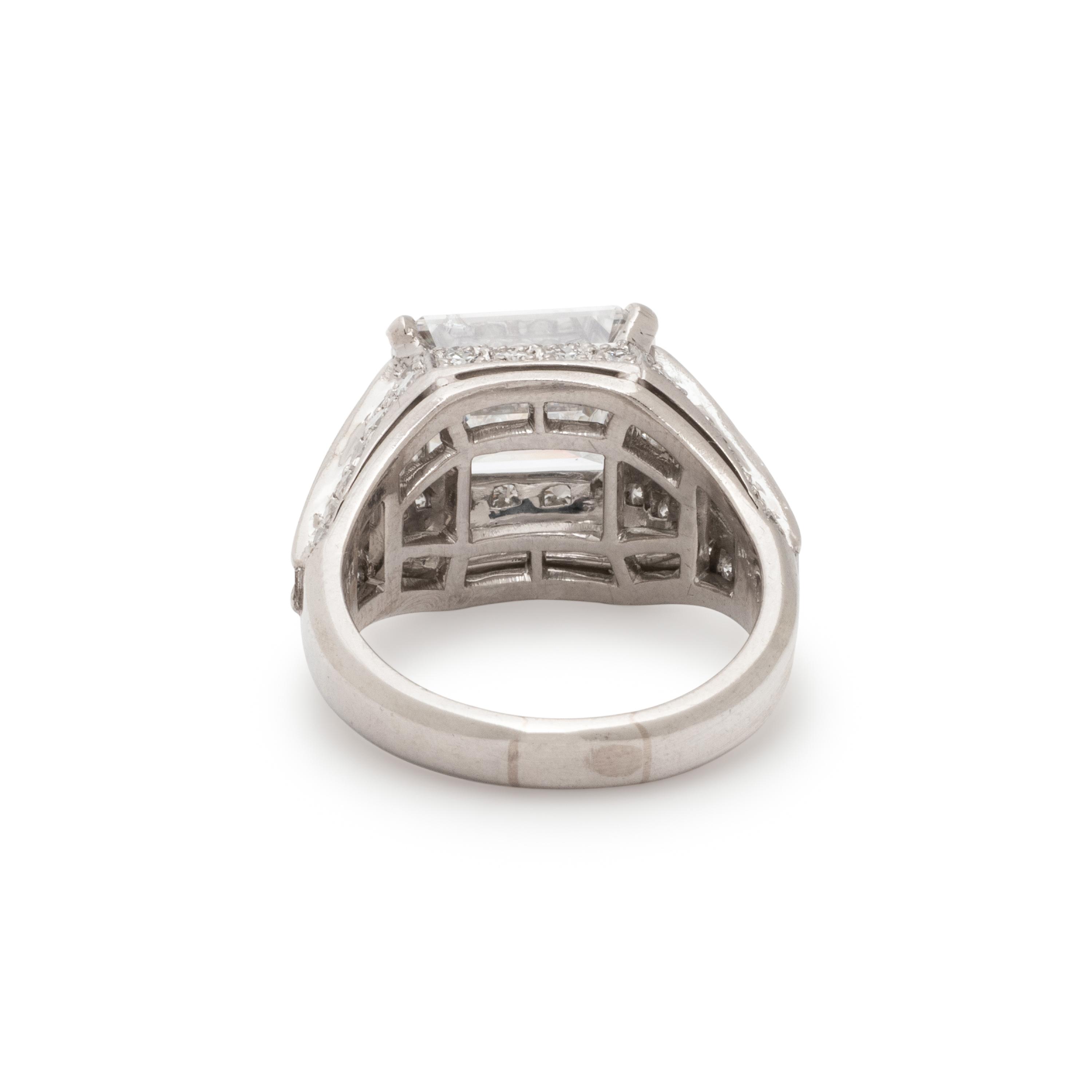 BULGARI, EMERALD CUT DIAMOND AND DIAMOND 'TROMBINO' RING